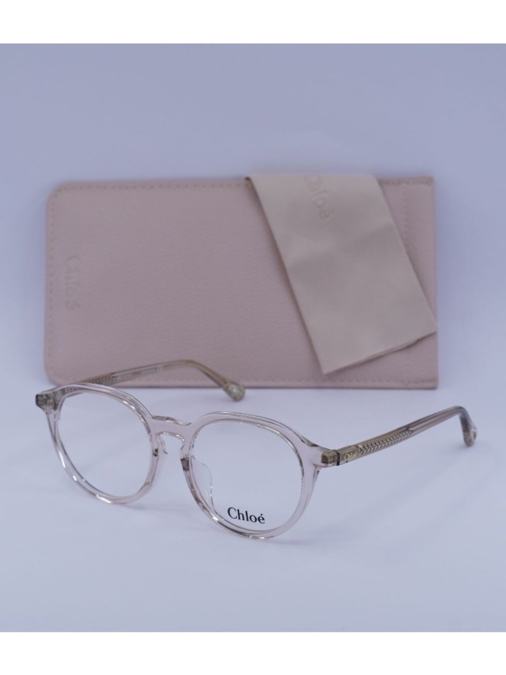 Chloe CH0012OA 001 Round Eyeglasses 50mm - Transparent Pink